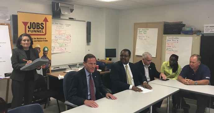 Photo of Senator Blumenthal meeting with CWP Job Funnel staff