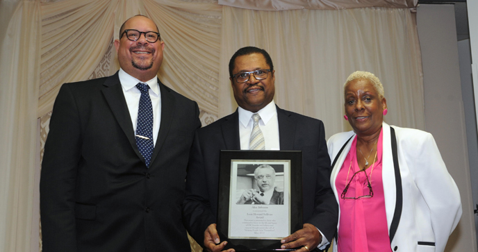 Photo of Alex Johnson receiving the Reverend Leon Howard Sullivan Award