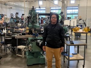 Christian Rolle a CNC machinist at Asnuntuck Community College