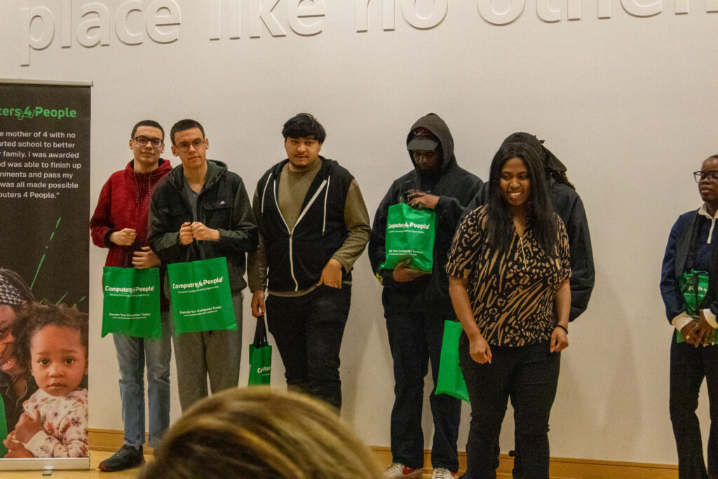 reciepients of new laptops from Hartford Public Library, City of hartford, and capital workforce partners