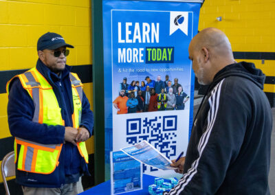 Man talking to recruiter at TDL Job Fair